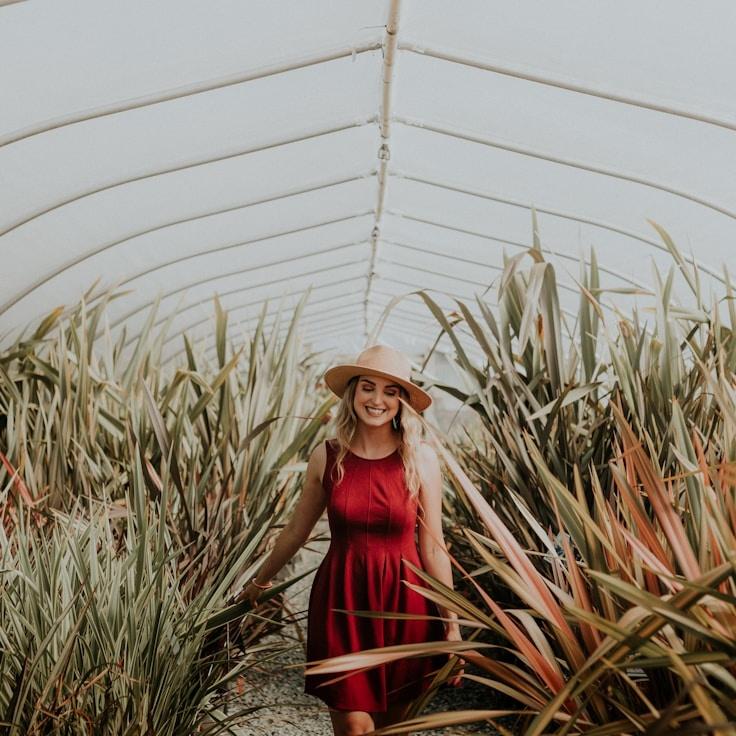 Avery Chen, Lead Design Curator at FoxIvyHub, reviewing corporate floral arrangements